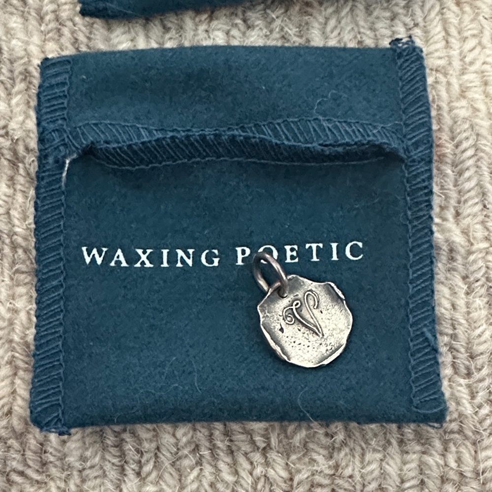 Waxing Poetic Silver Pendant Charm